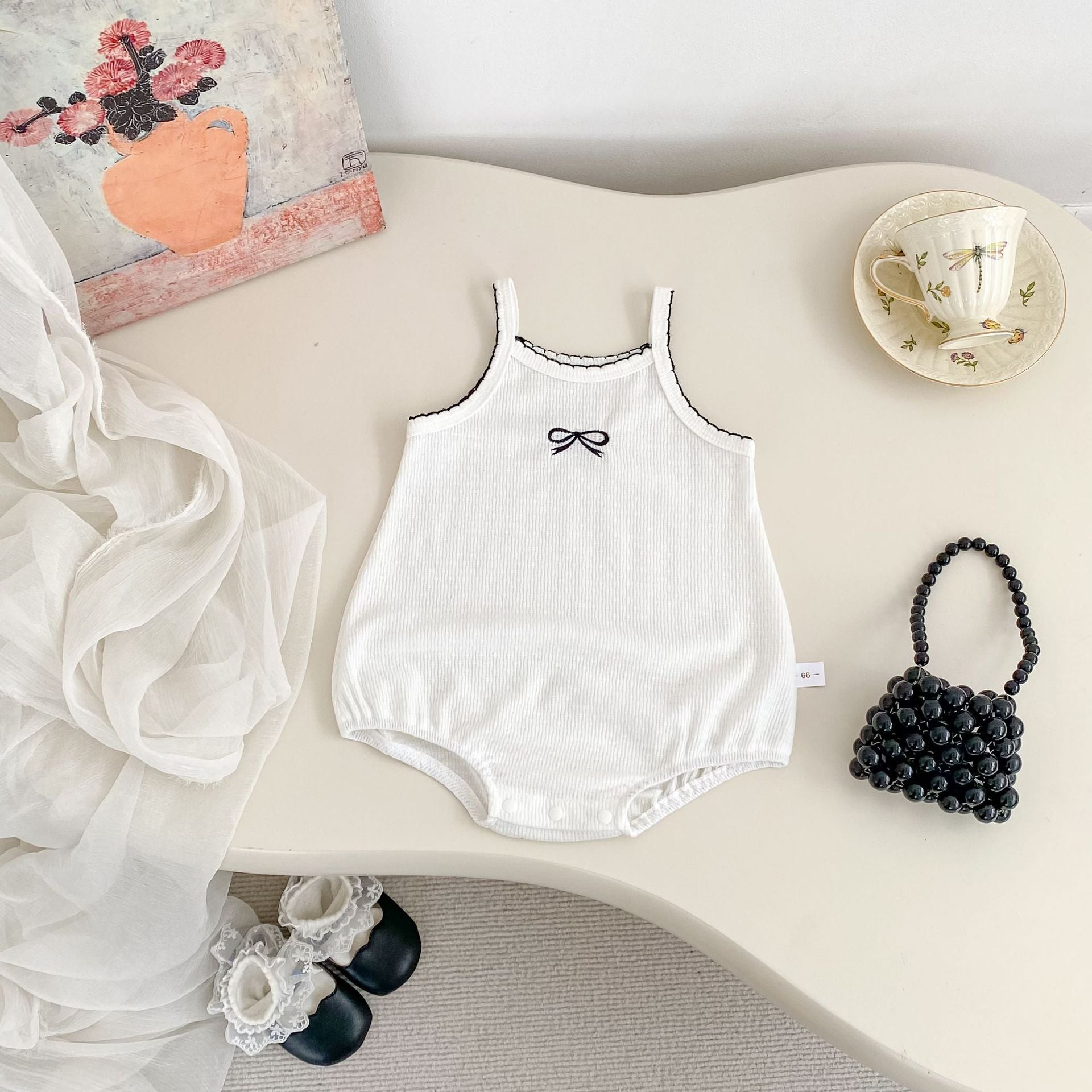 Noelle Bow Romper